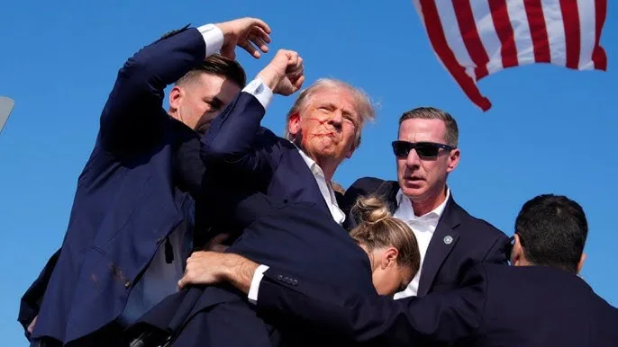 Trump é retirado de comício após sons de tiros